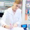 Female pharmacist doing daily duties