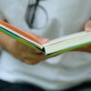 woman in white shirt holding book to read ,Business concept. Business idea